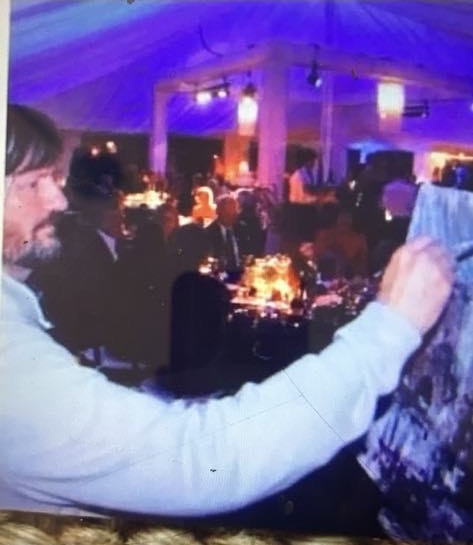 Danny painting live at a wedding reception