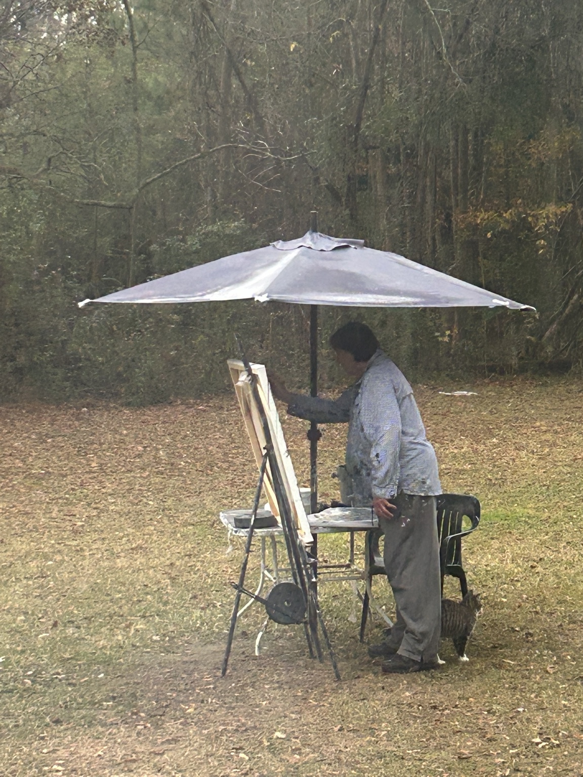 Danny painting outdoors at an easel